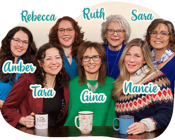 Rainbow Resource Consultants Amber, Sara, Ruth, Rebecca, Nancie and Gina sitting together on a couch